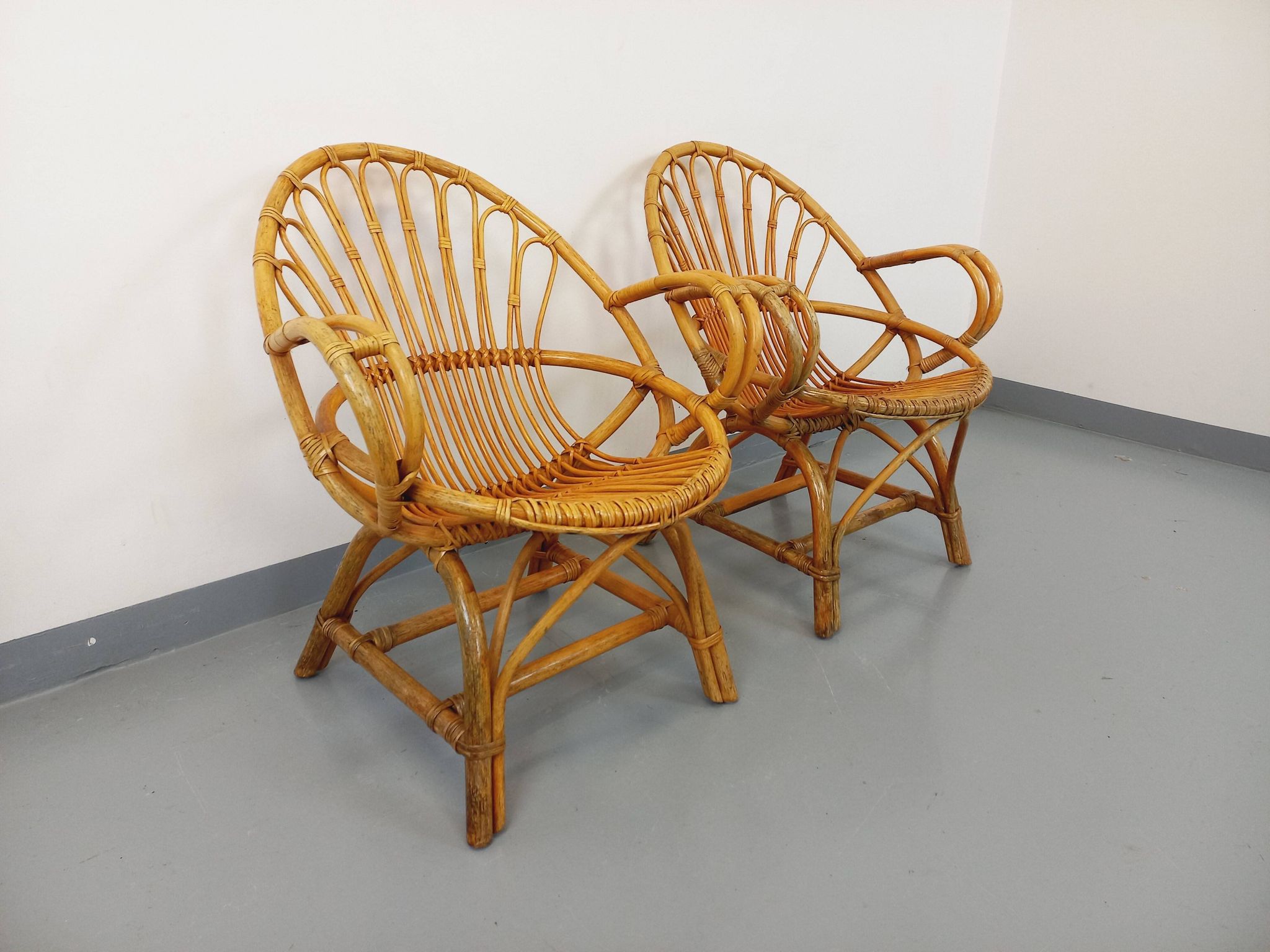 Pair of vintage rattan armchairs from the 60s