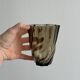 Smoked glass vase with twisted design