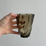 Smoked glass vase with twisted design