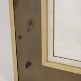 Mirror in marquetry of oxidised and patinated brass. Artist's work.