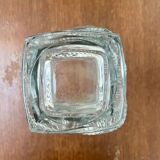 Large moulded glass vase with a floral design