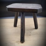 Dark octagon tripod stool