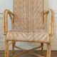 High-backed adult rattan armchair, circa 1960