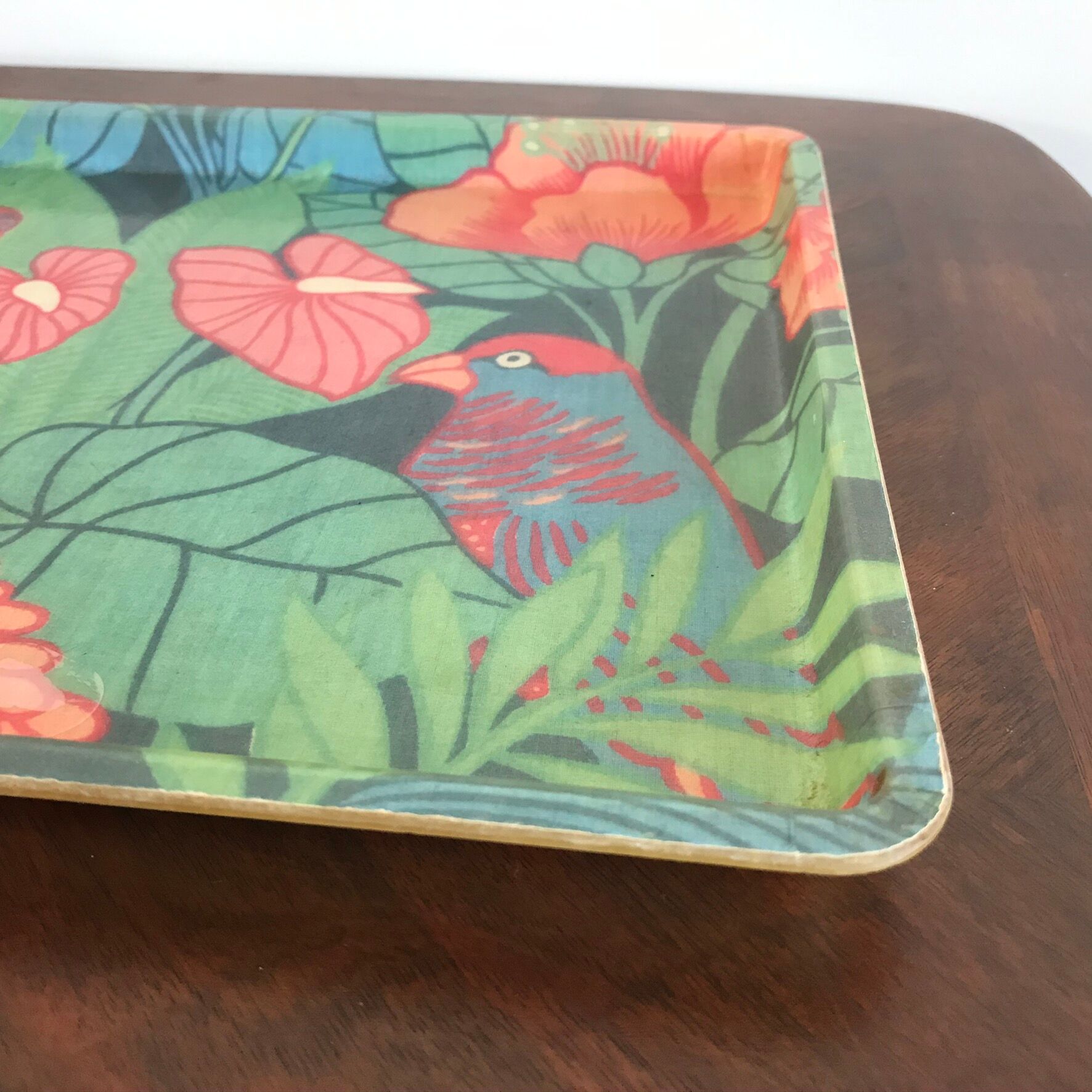 Vintage fiberglass platter with exotic décor and parrots