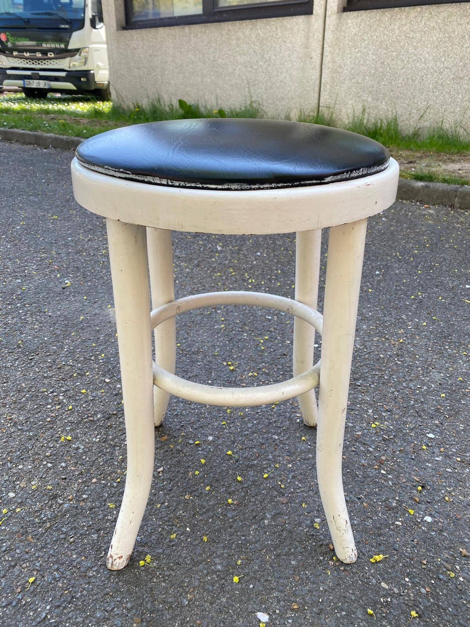 Round stool in white bentwood and black leather