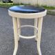 Tabouret rond en bois courbé blanc et cuir noir