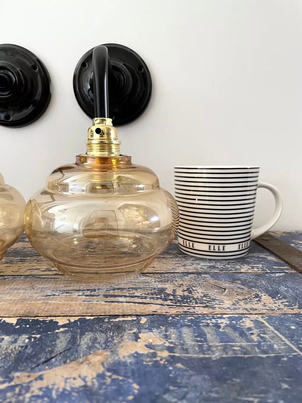 Pair of vintage sconces in electrified golden glass to nine