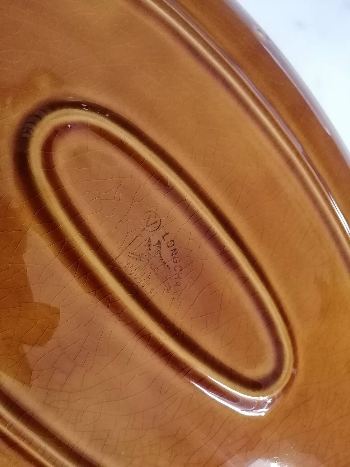 Longchamp dish by Picault