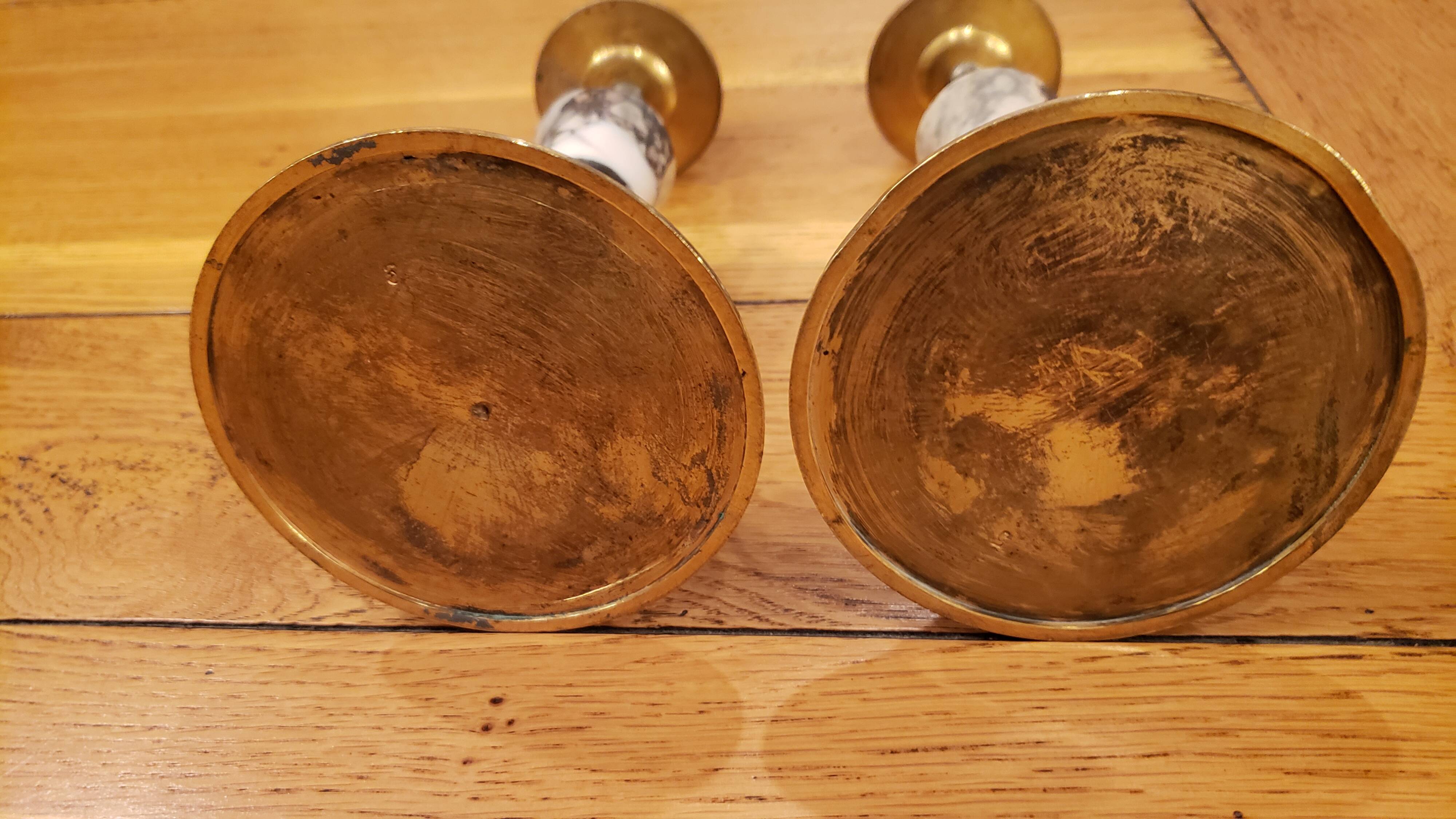 Pair of brass + marble or stone candlesticks