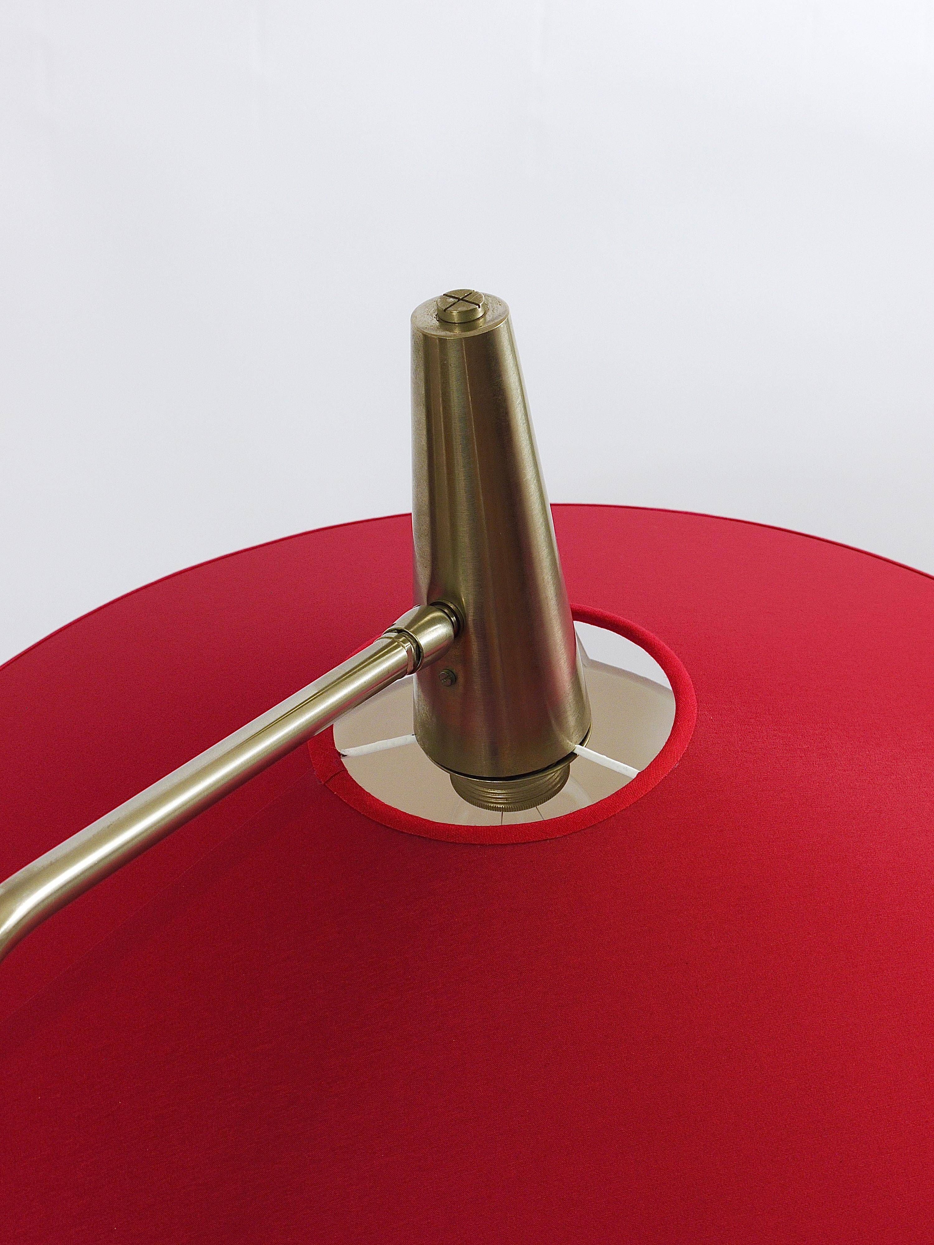 Articulated floor lamp with counterweight mid-century by Rupert Nikoll, nickel, brass.