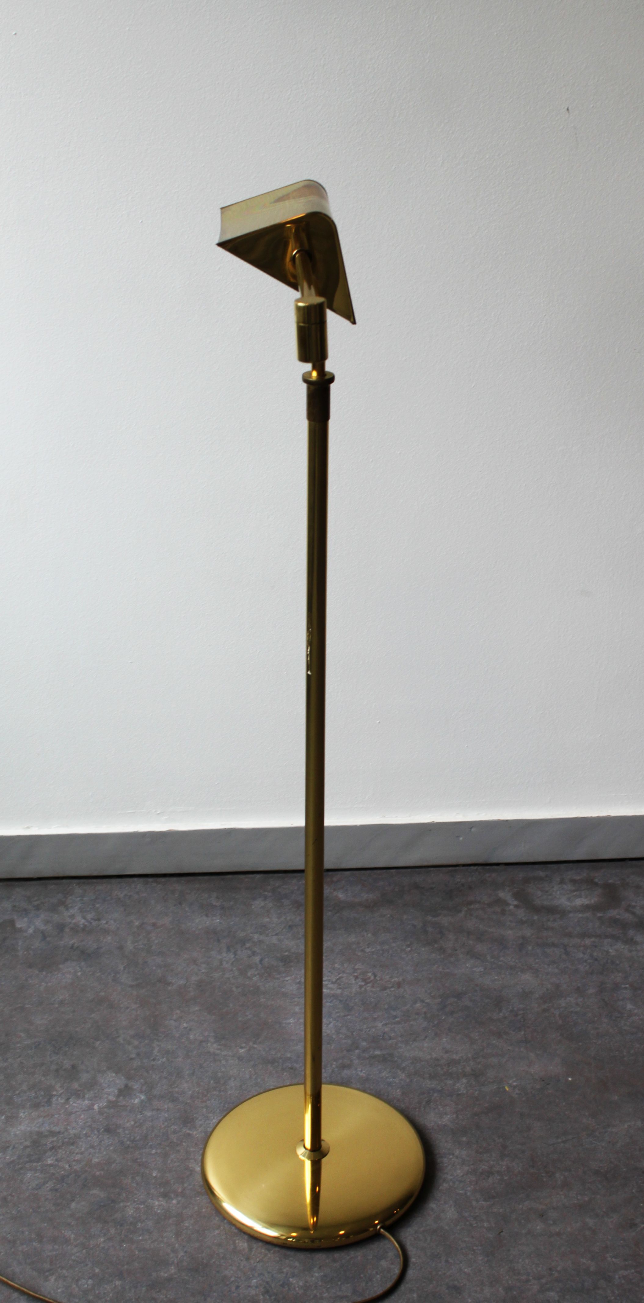 Gilded brass articulated reading light, France, 70's.