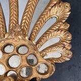 Palm-shaped faceted mirror