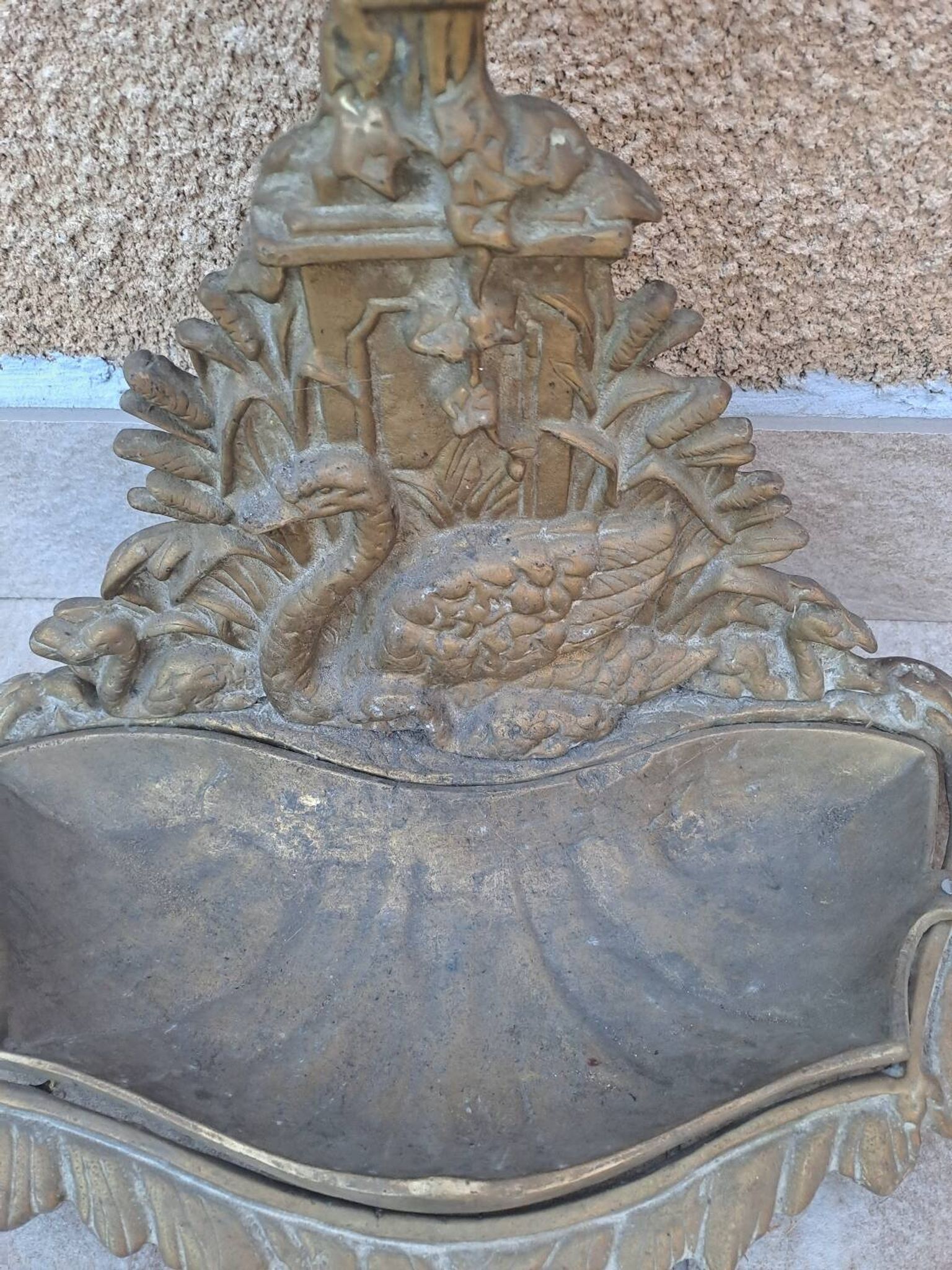 Bronze and brass umbrella stand decorated with a swan