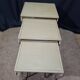 Nesting tables in patinated iron.
