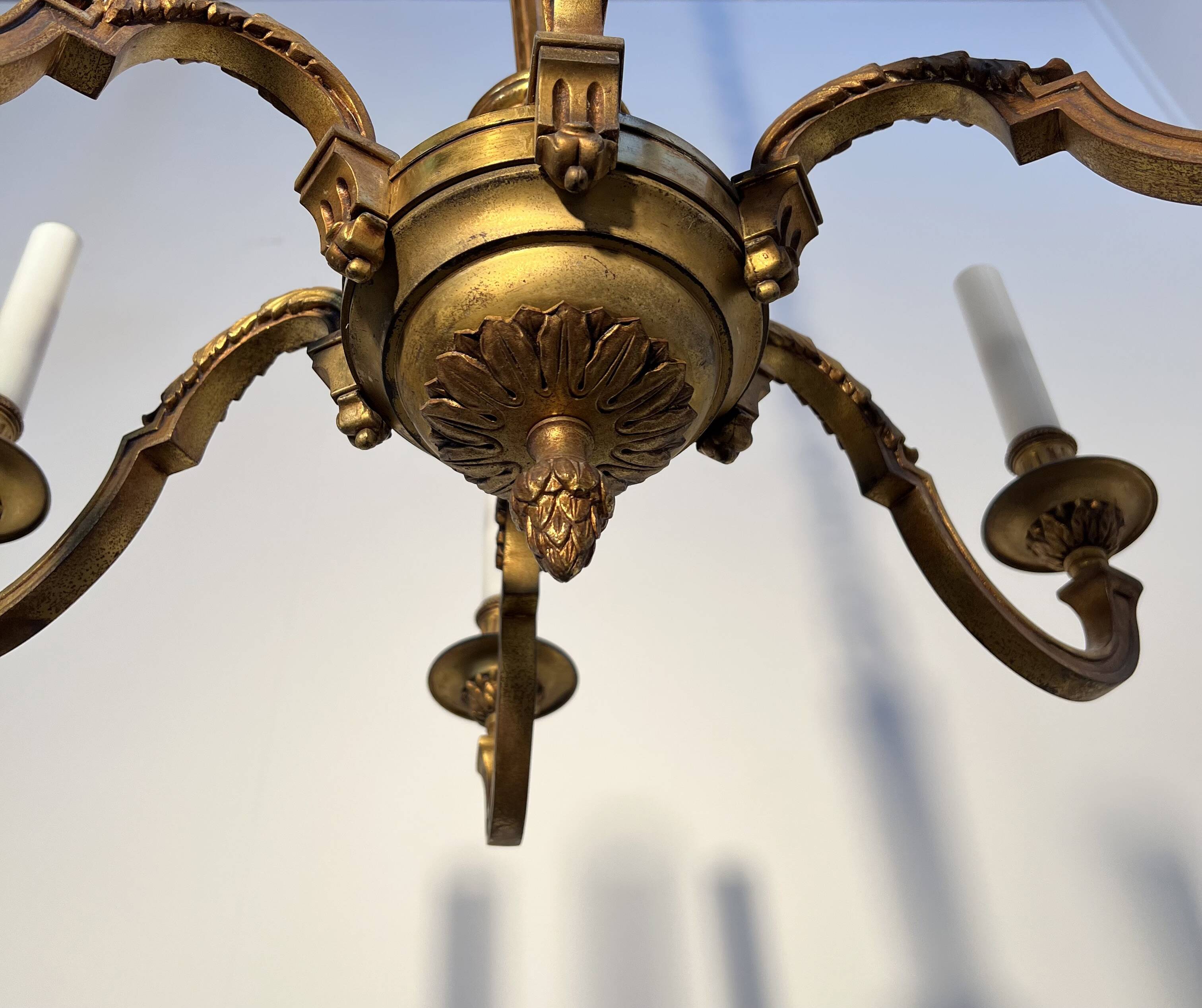 Important six-light chandelier in chiselled gilded bronze, Empire, 19th century