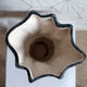 Black and white speckled ceramic vase signed Annette ROUX.