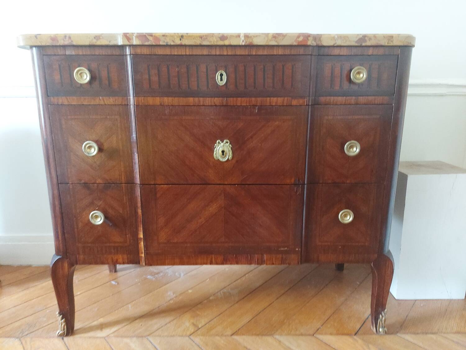 Wooden and marble chest of drawers