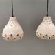 Two ceramic hanging lamps, in creamy white color, looking almost like coral