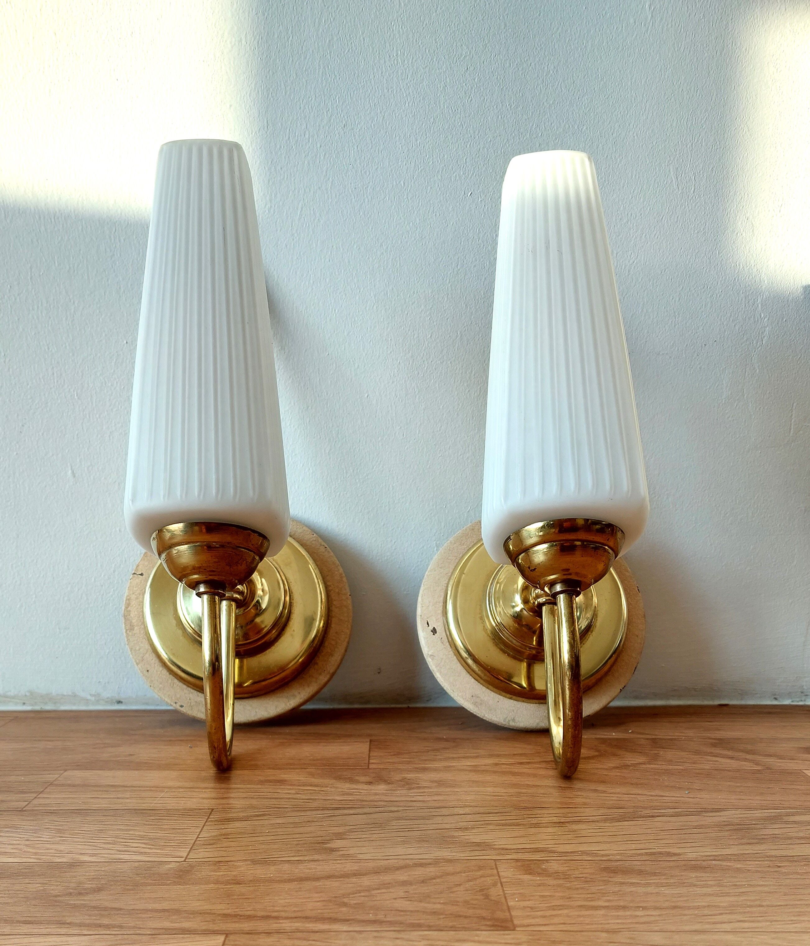 Pair of sconces with a light arm, brass and white opaline 1960.