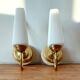 Pair of sconces with a light arm, brass and white opaline 1960.
