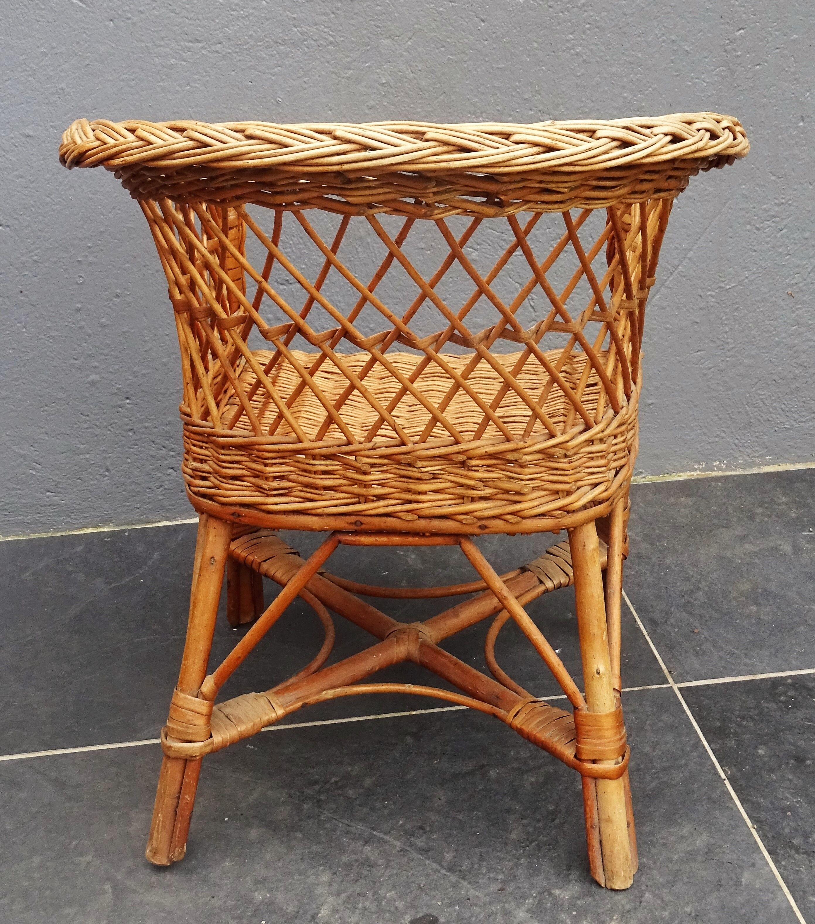 Vintage rattan wicker child's armchair