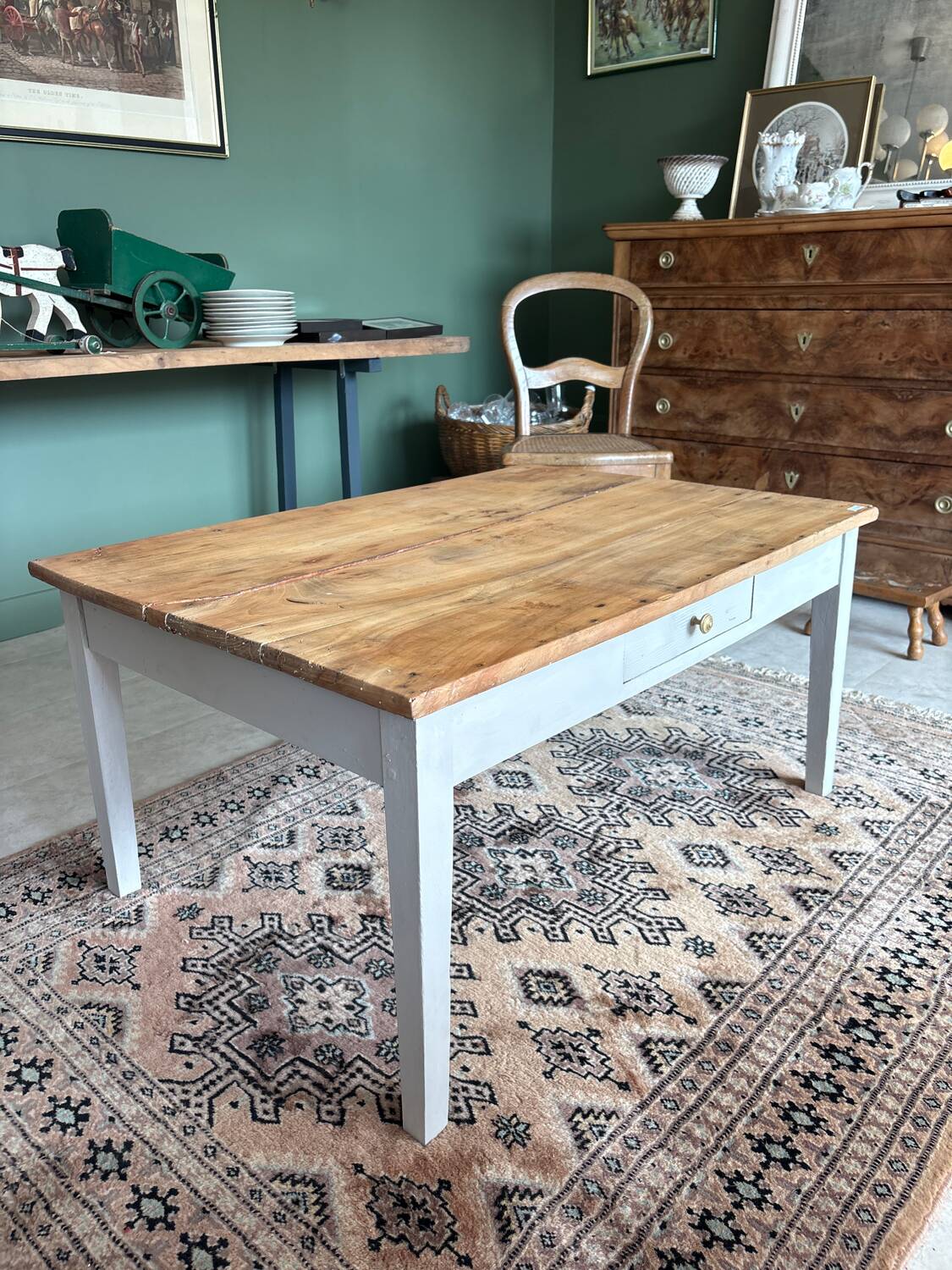 Coffee table with sandblasted top and painted legs.