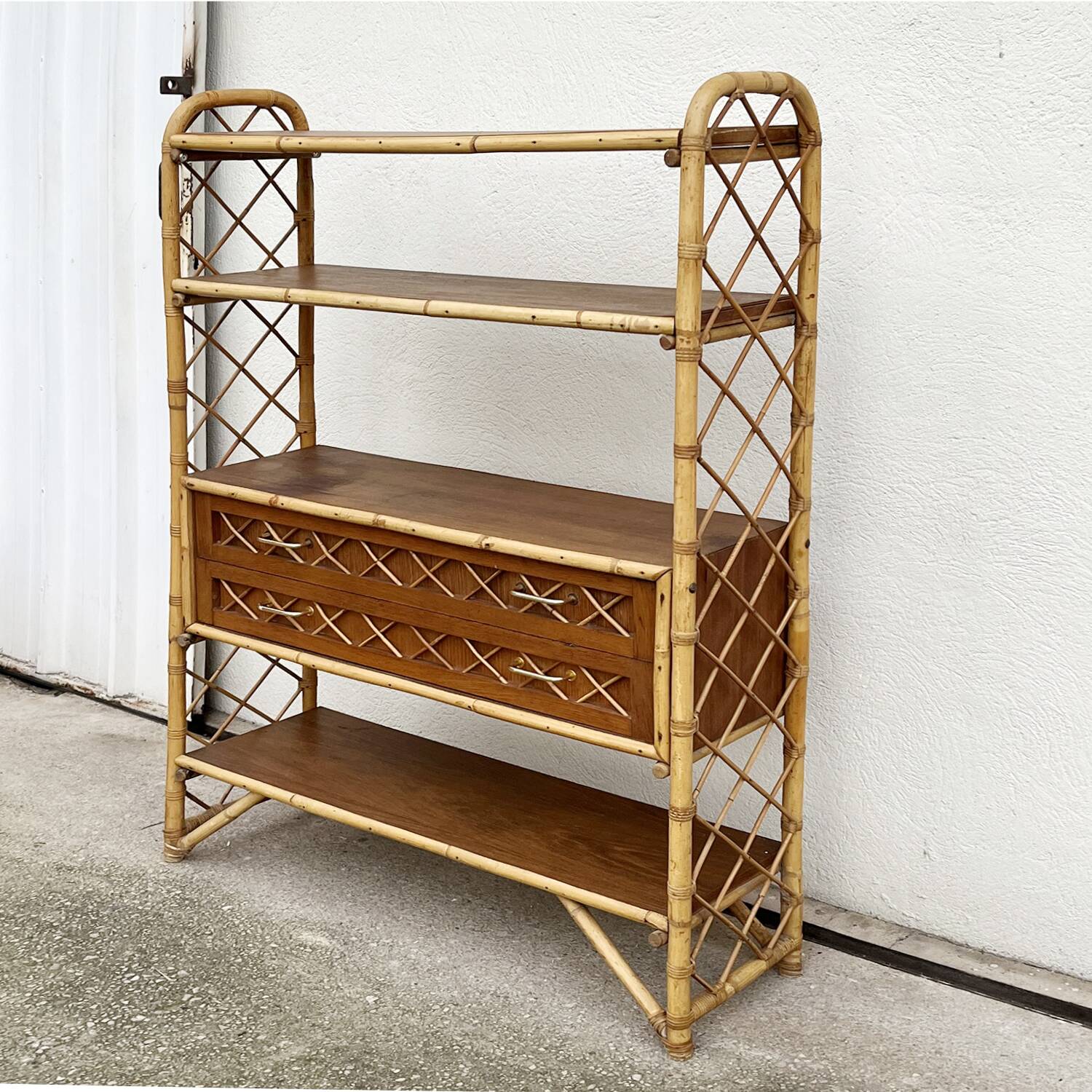 Rattan and bamboo bookcase by Louis Sognot