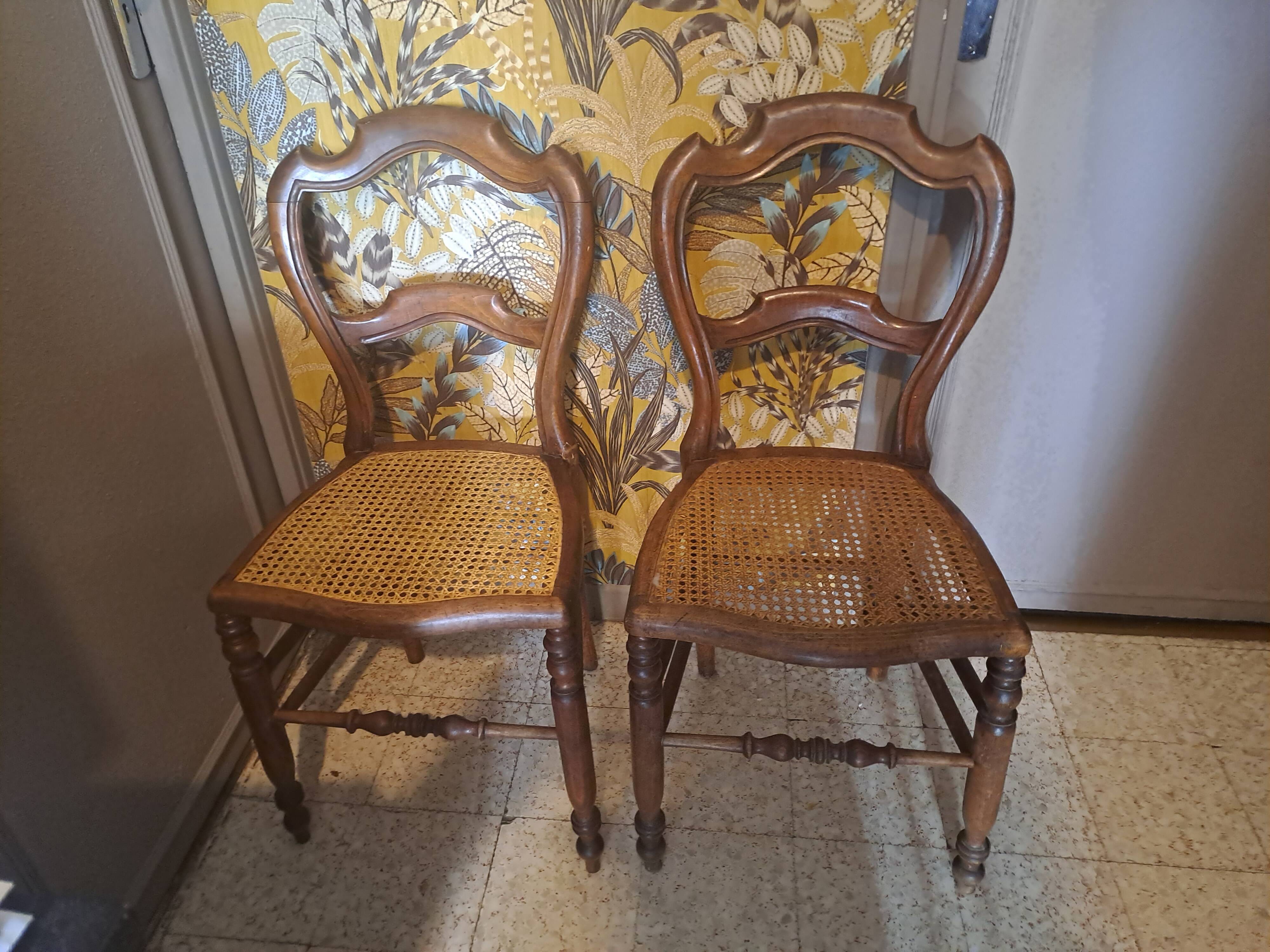 Pair of 1950s light wood bistro chairs with cane seats