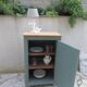 Vintage jam jar enhanced in smoky green, wooden tray.