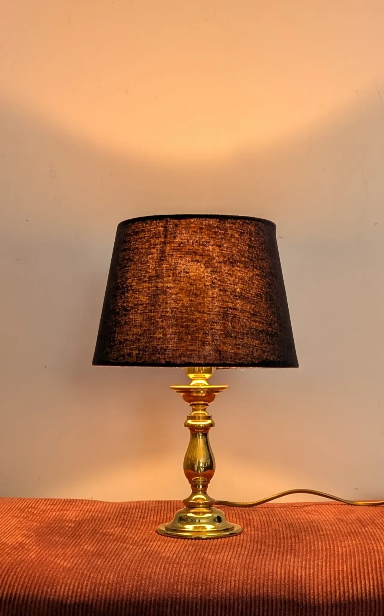Brass lamp with black fabric shade
