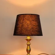 Brass lamp with black fabric shade