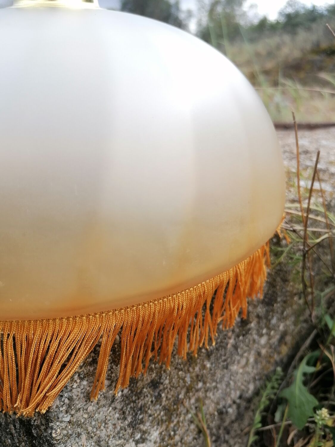 Vintage suspension with frosted glass fringes.