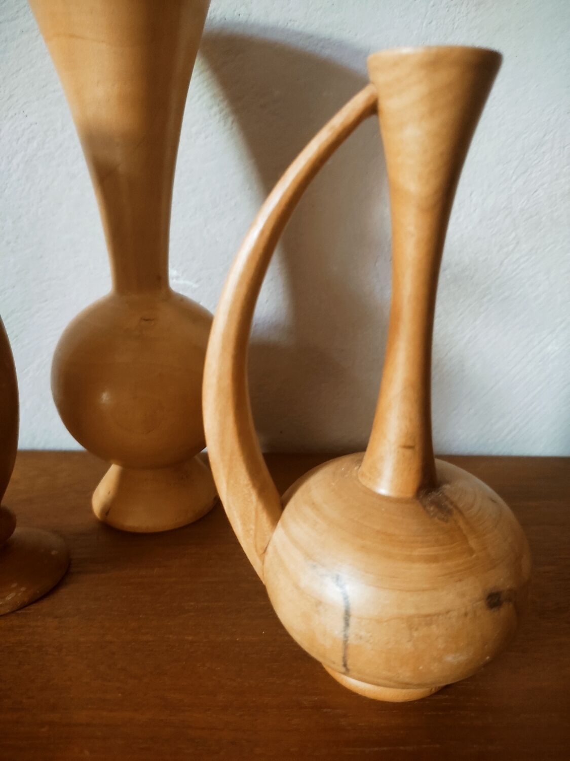 Set of 4 turned wooden vases