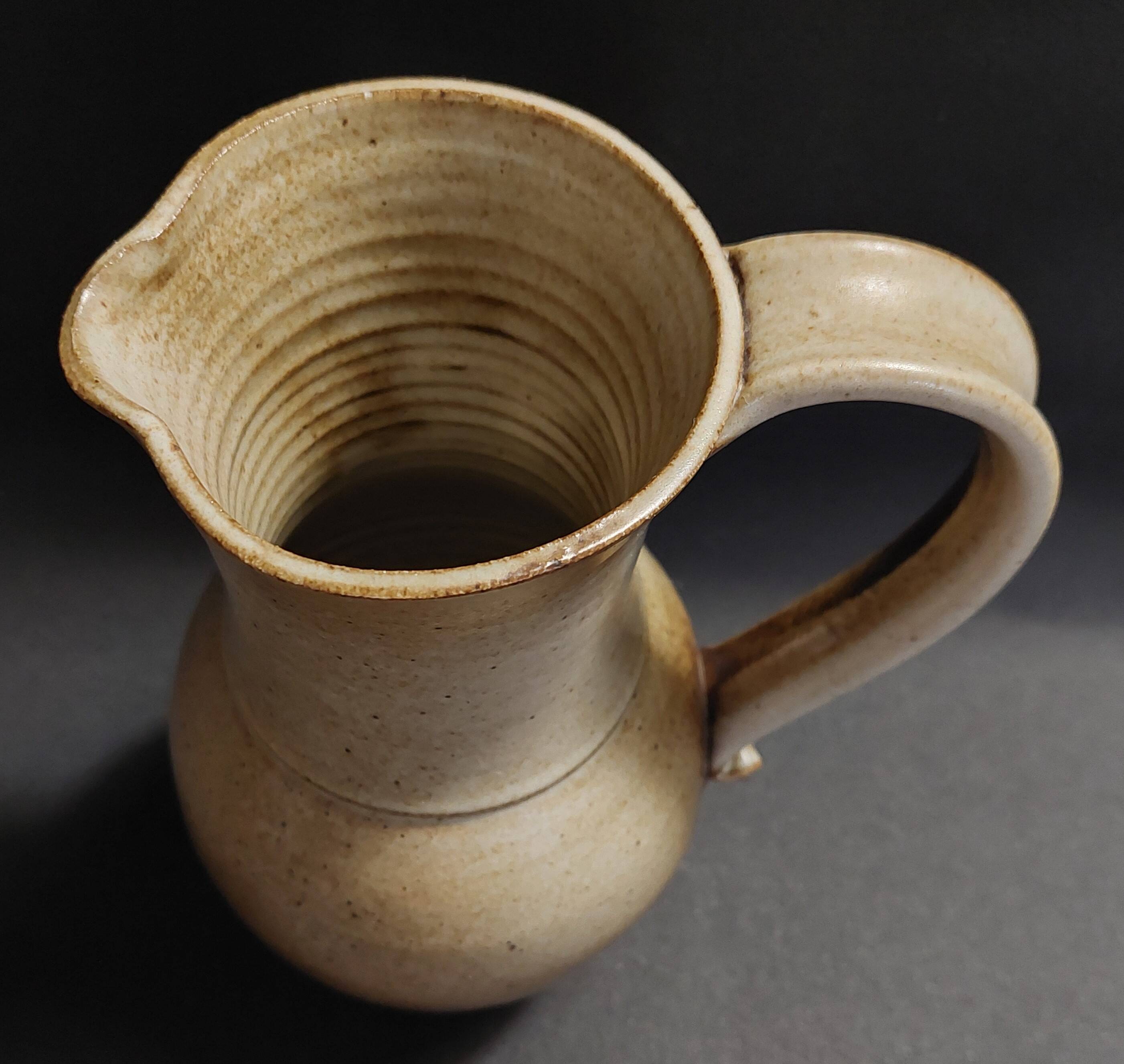 Stoneware pitcher signed Tournay, 1970s