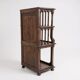 Glass-fronted walnut shelf