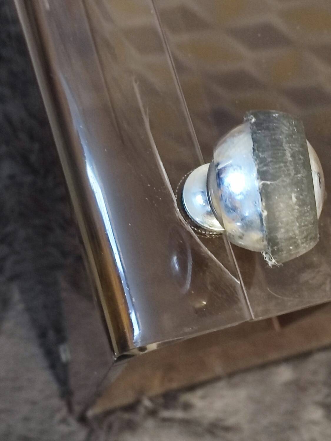 Michel Dumas smoked Plexiglas rolling table.