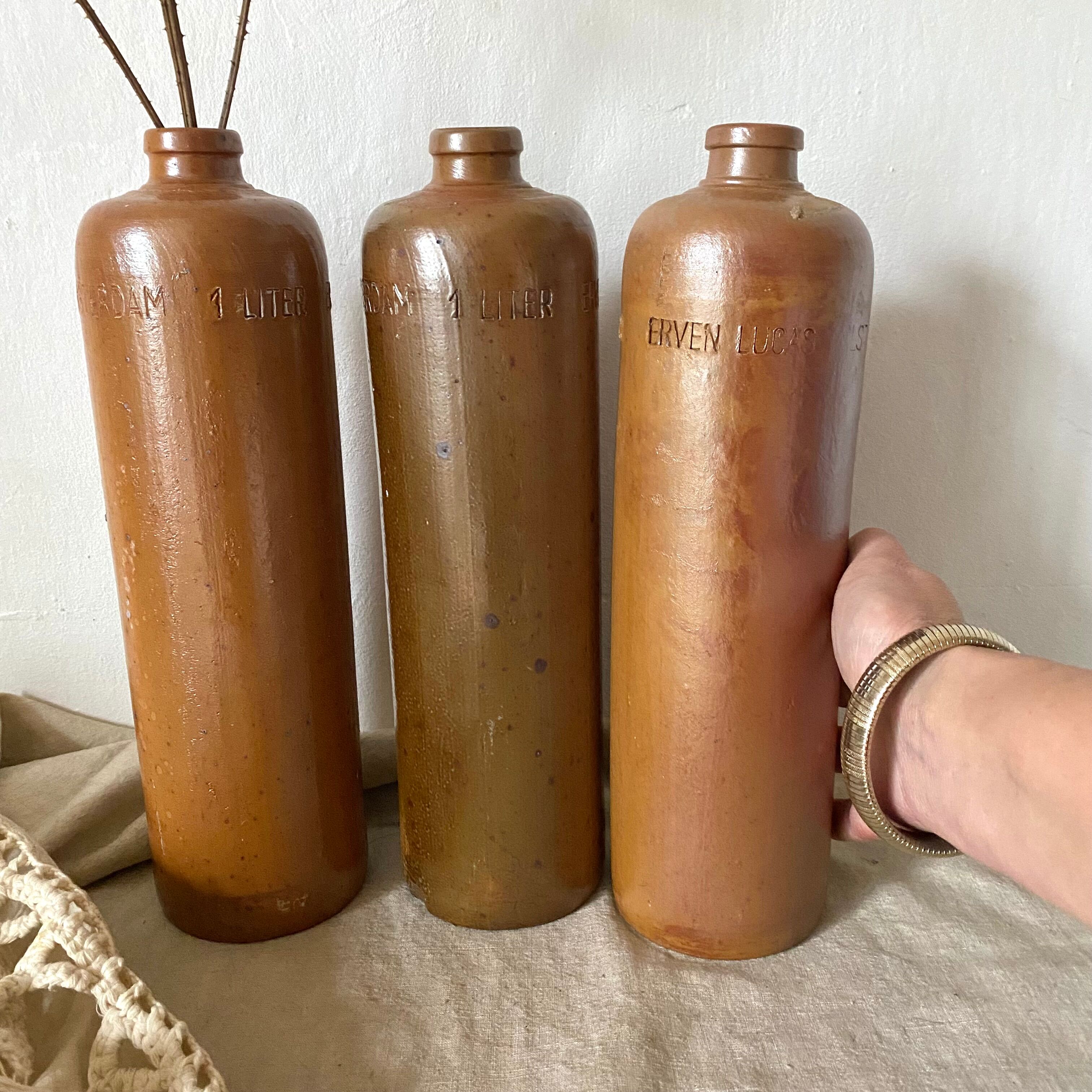 Antique stoneware bottles Erven Lucas Bols Het Lootsje Amsterdam