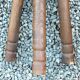 Pair of triangular turned wood stools or harnesses