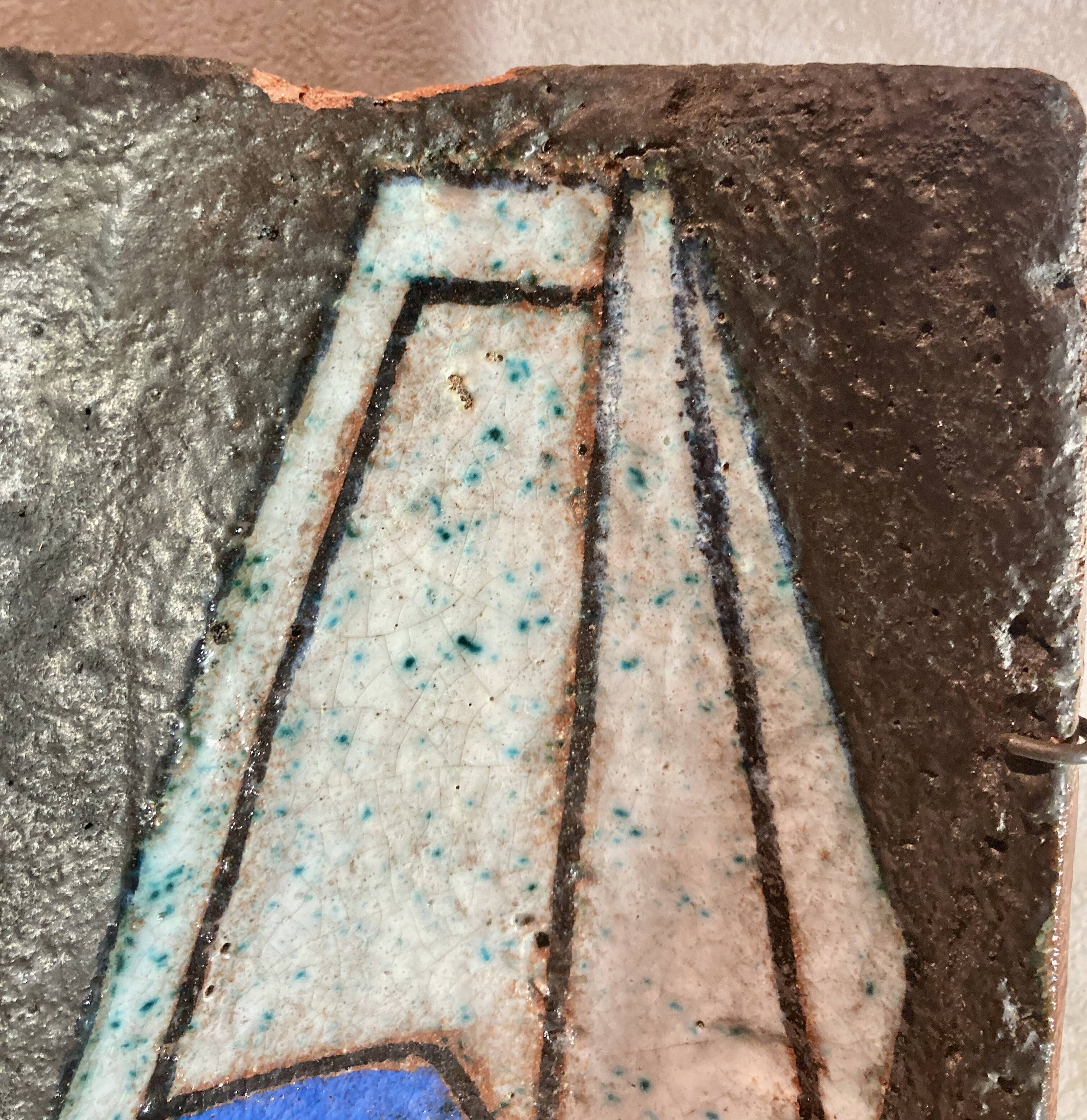 Terracotta tile with enamel decoration of a lady of the high nobility signed OGD