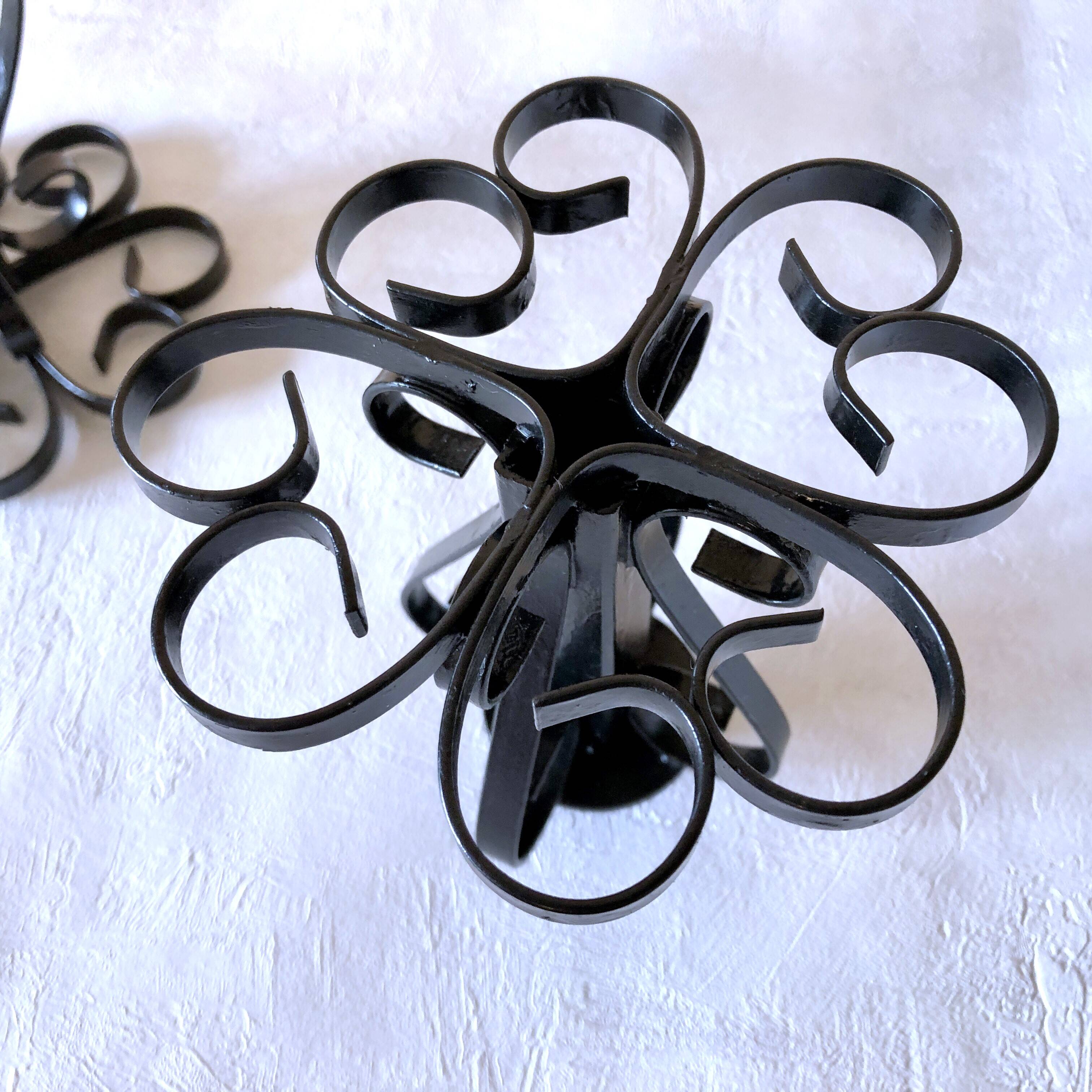 Set of two vintage twisted wrought iron candlesticks