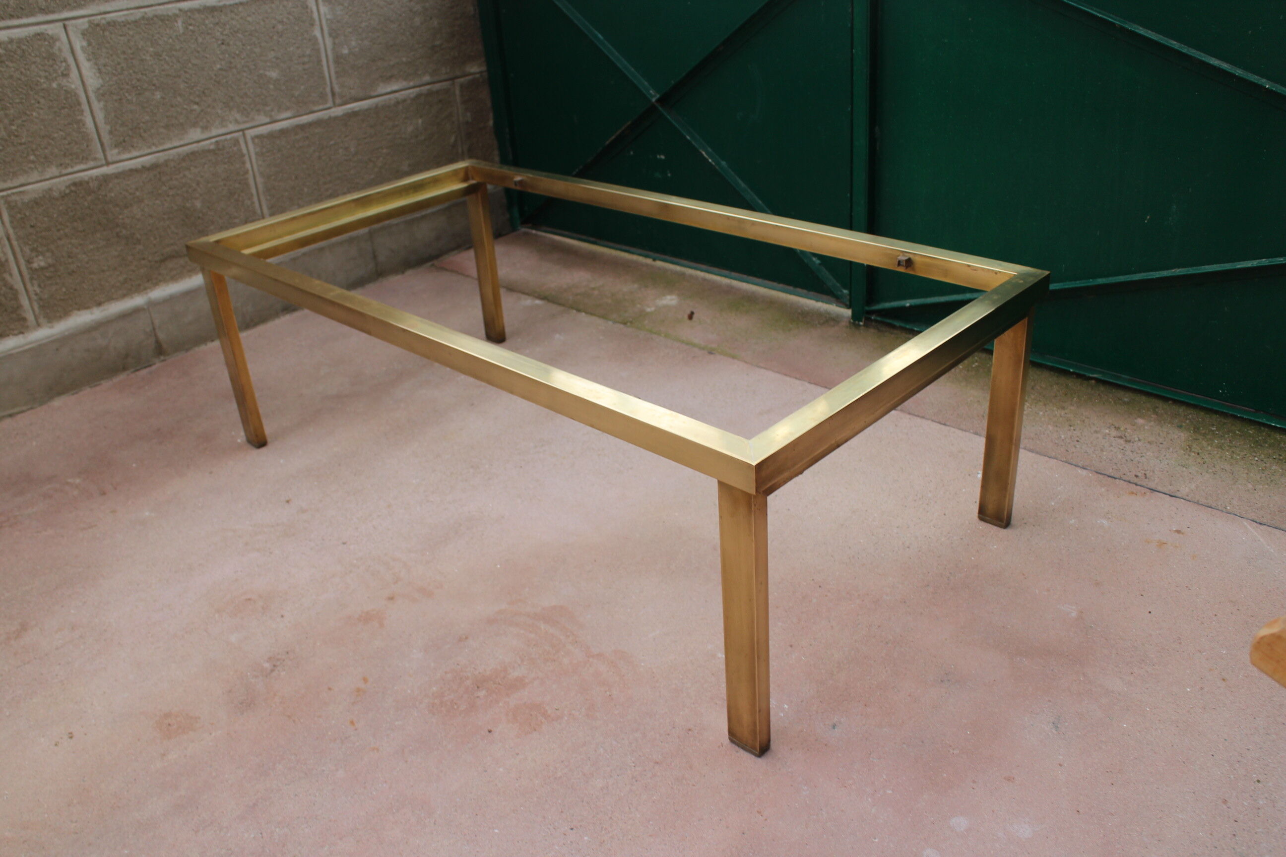 Brass coffee table and 1970 smoked glass