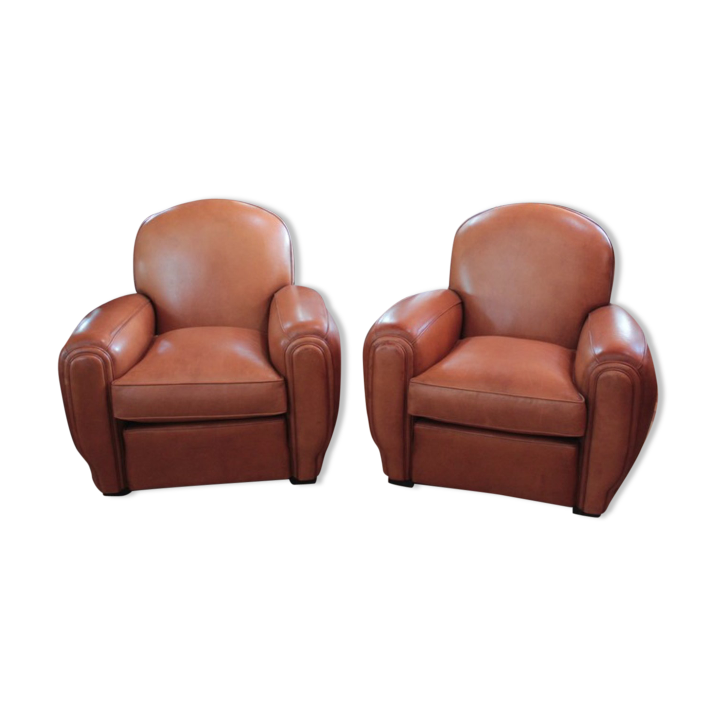 Pair of club chairs in leather