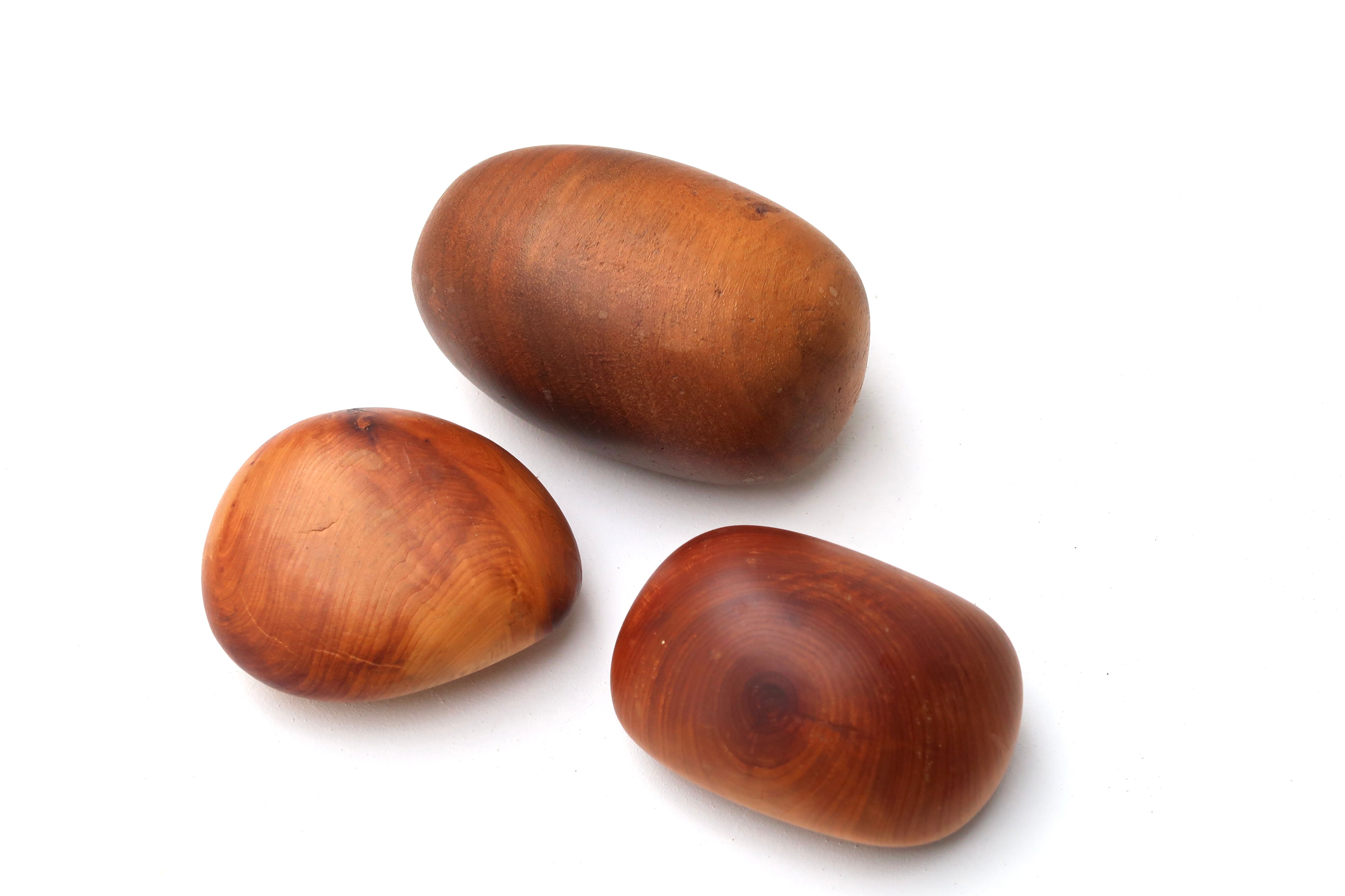 Set of three wooden paperweights 70s