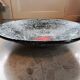 Large stoneware platter signed c. pitot, mid-20th century, black, white, and red glazed ceramic
