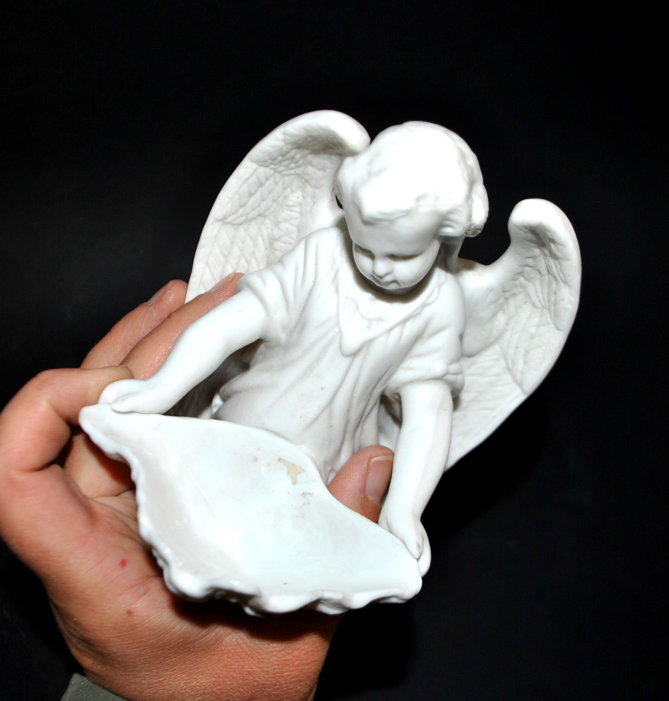 Antique angel font in biscuit porcelain from Sèvres signed MF