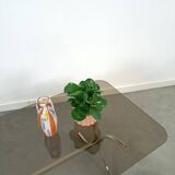 Smoked glass coffee table with gold-coloured legs from Sweden