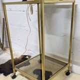 Vintage rolling table in brass and smoked glass