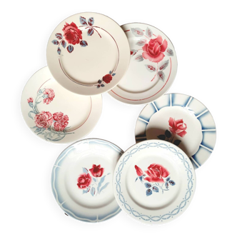 Old mismatched earthenware dinner plates