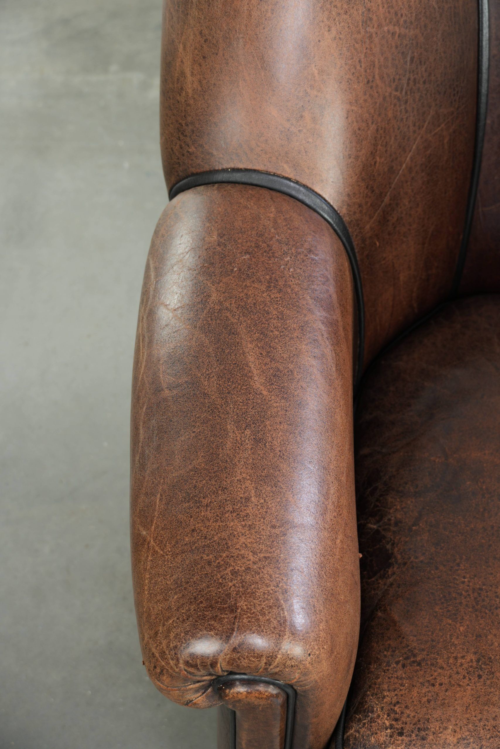 Vintage sheepskin armchair with a unique design and timeless appearance