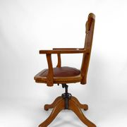 American swivel office armchair in oak, with leather seat, USA, Circa 1900